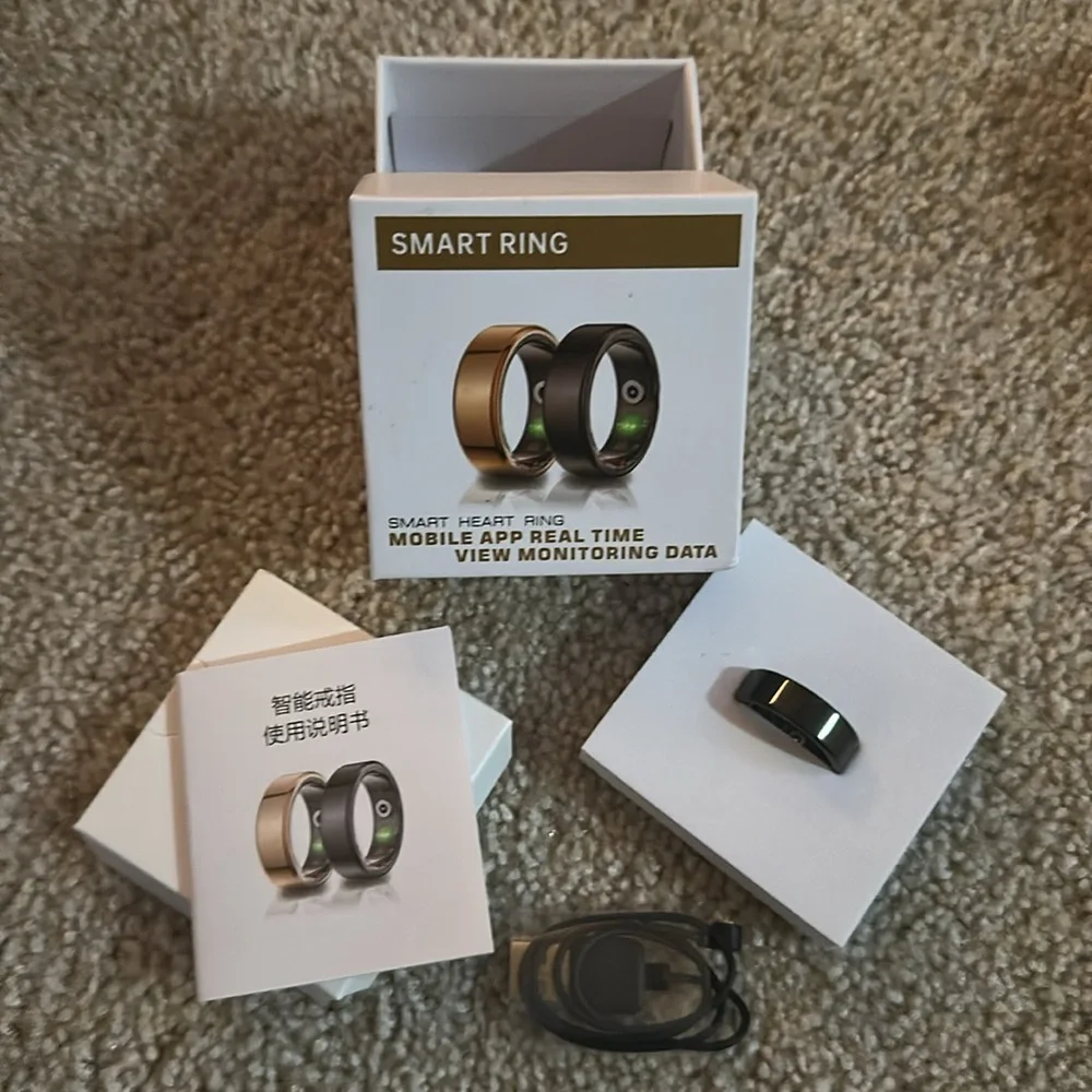 Minimalist Gold and Black Wearable Rings with Smart Features
